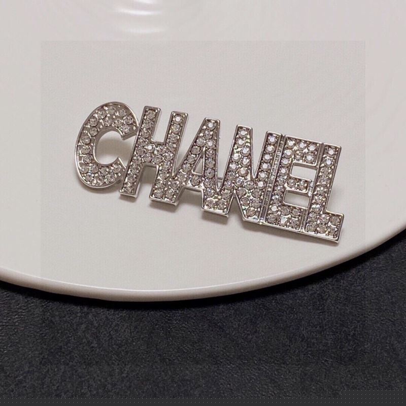 Ch*el brooches